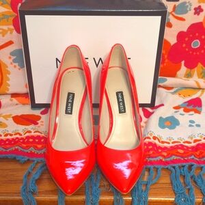 Nine West red pumps
